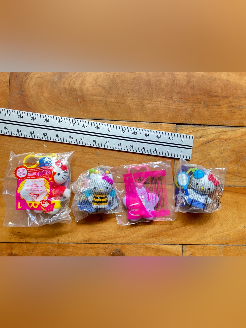 Sanrio Hello Kitty Mini Figure Set with Pink, Blue, Yellow and Red Accents